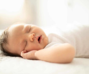 best sleeping position for gassy baby